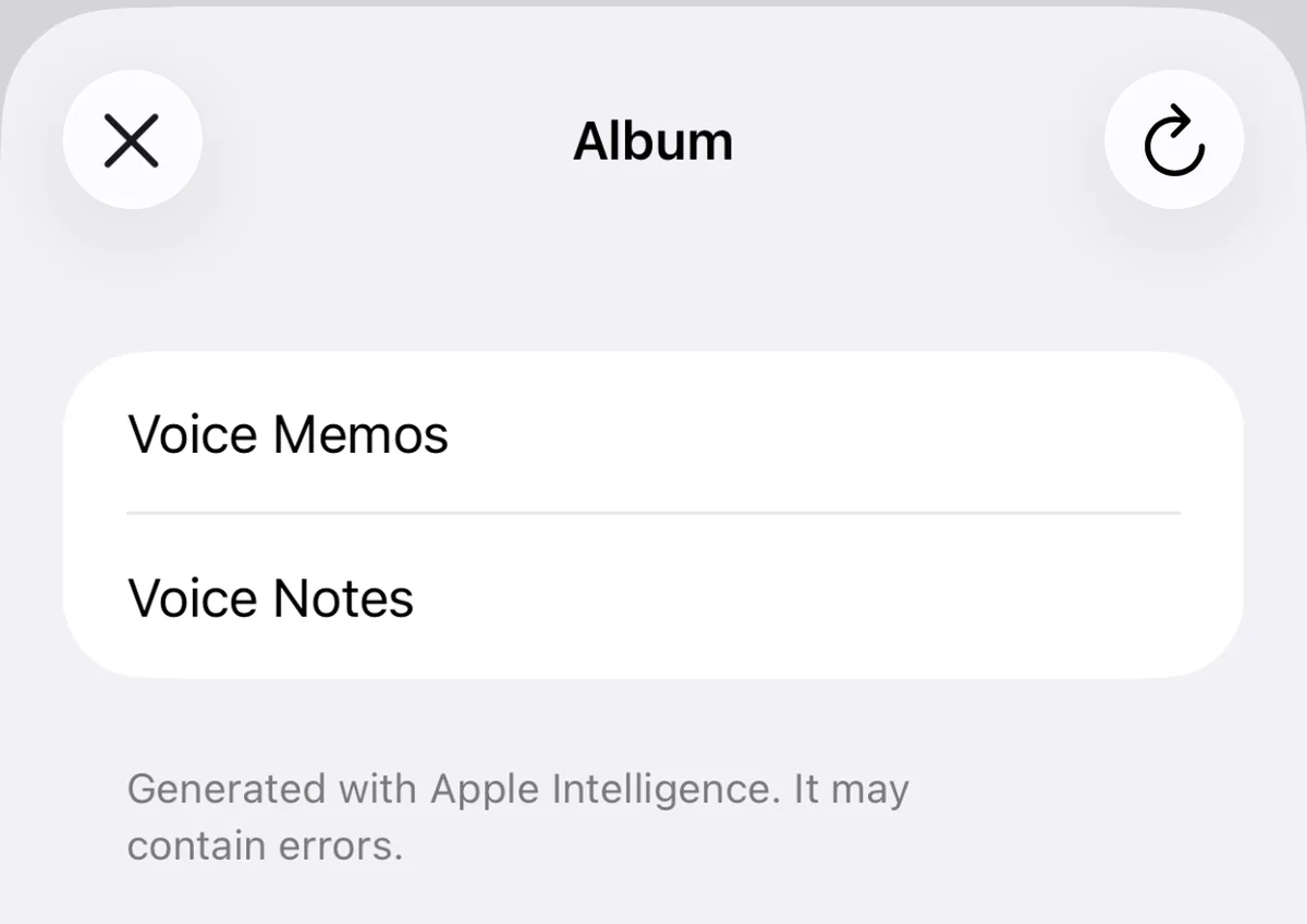 Played offering two album suggestions for a file, above the line that says the text was generated with Apple Intelligence and may contain errors.